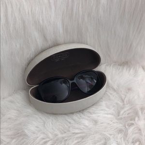 Authentic Coach purple signature sunglasses.